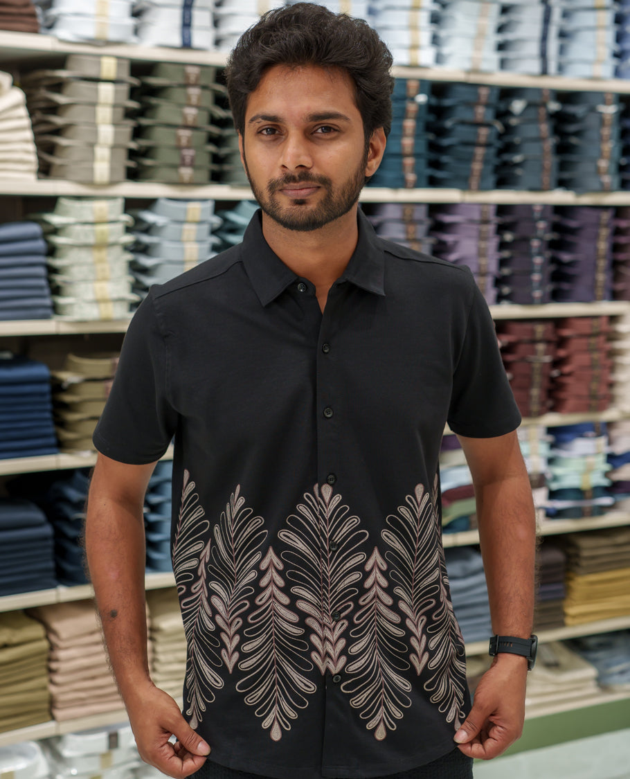 Black Cotton-Blended Casual Shirt Comes with Tropical Floral Print, Spread Collar, Half Sleeves, Regular Fit, and Regular Length
