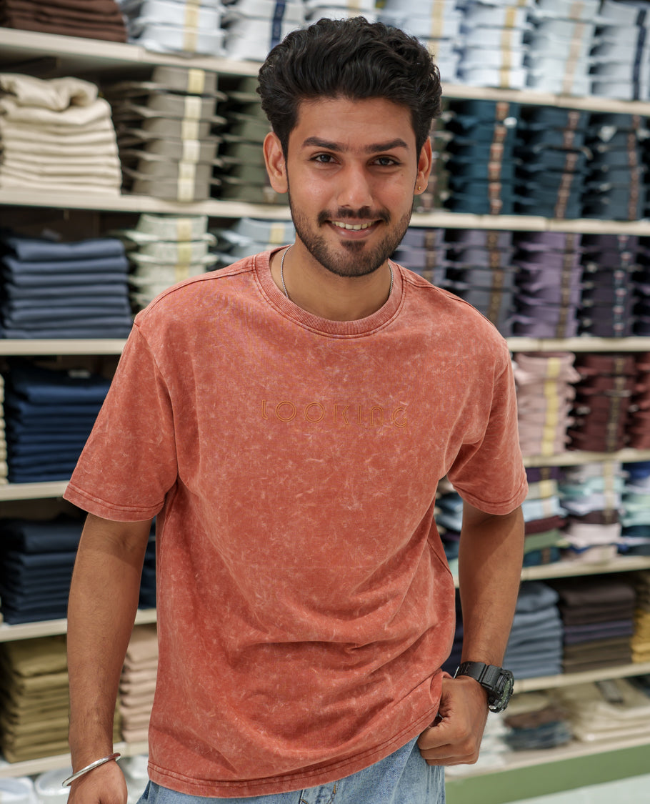 Orange Cotton-Blended Lava-Wash T-Shirt Comes with a Typographic Print, Crew Neck, Half Sleeves, Oversized Fit, and Regular Length