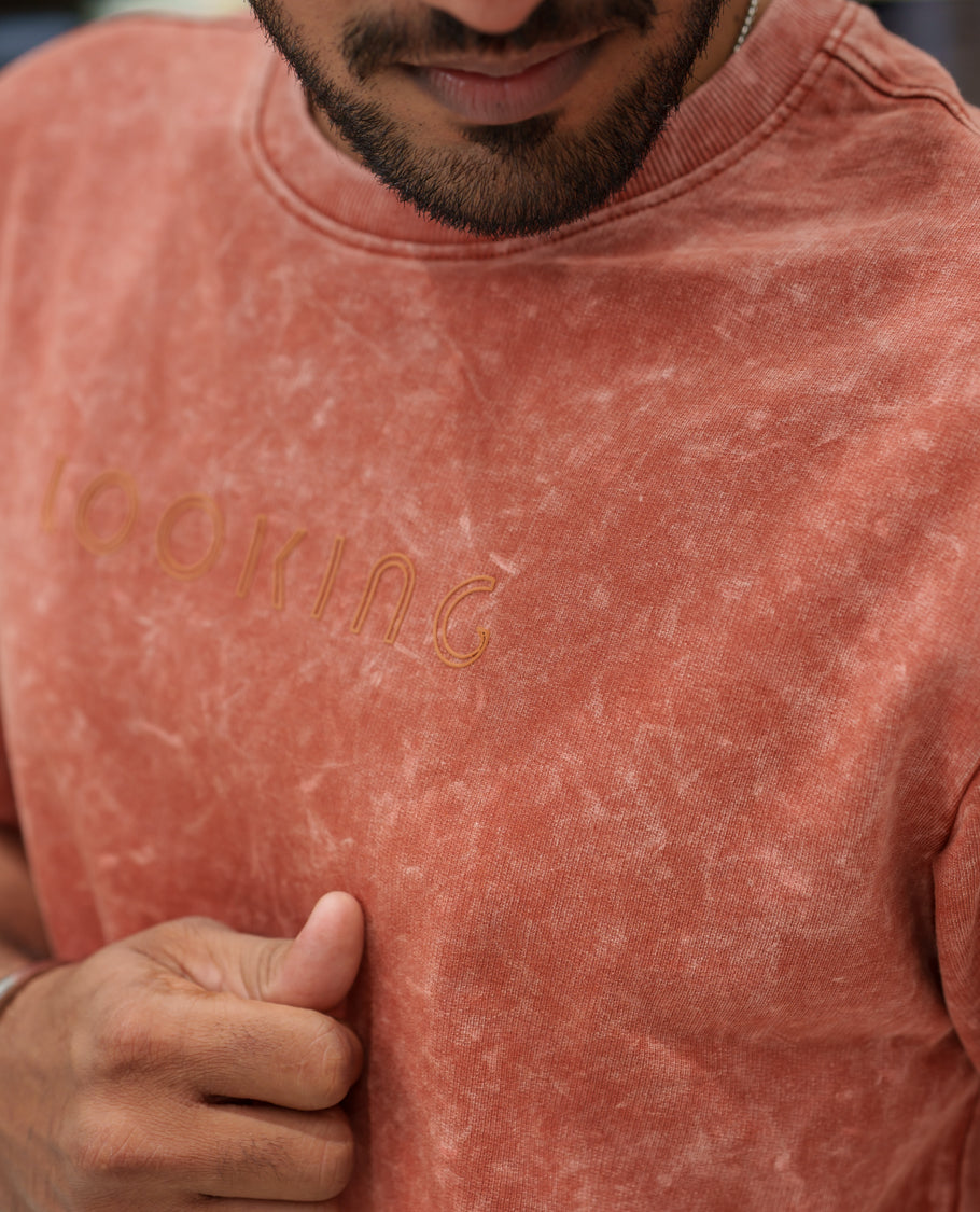 Orange Cotton-Blended Lava-Wash T-Shirt Comes with a Typographic Print, Crew Neck, Half Sleeves, Oversized Fit, and Regular Length