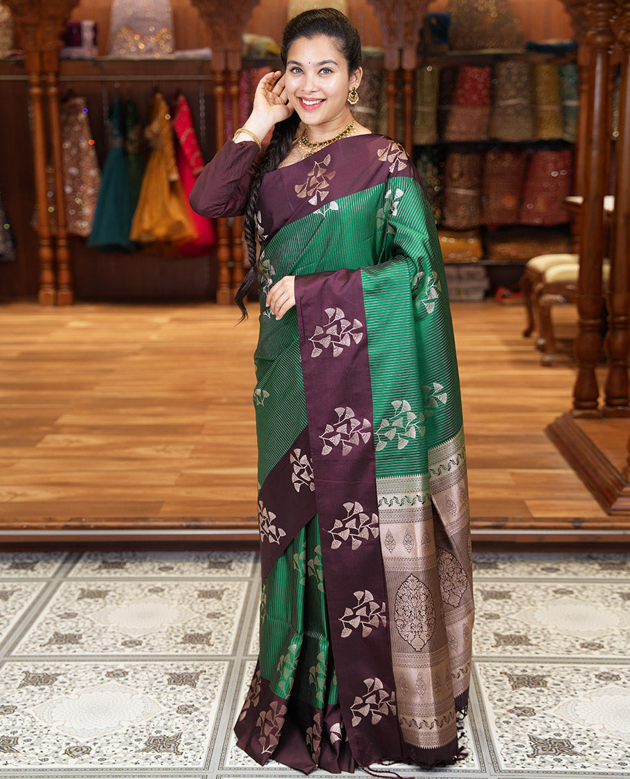Dark Green Semi-Soft Silk Saree, Highlighted by Vaira Oosai Stripes and Floral Buttas All Over Its Body, Complemented by a Contrast Floral Buttas Border, an Intricately Designed Pallu, and Paired with a Contrast Blouse