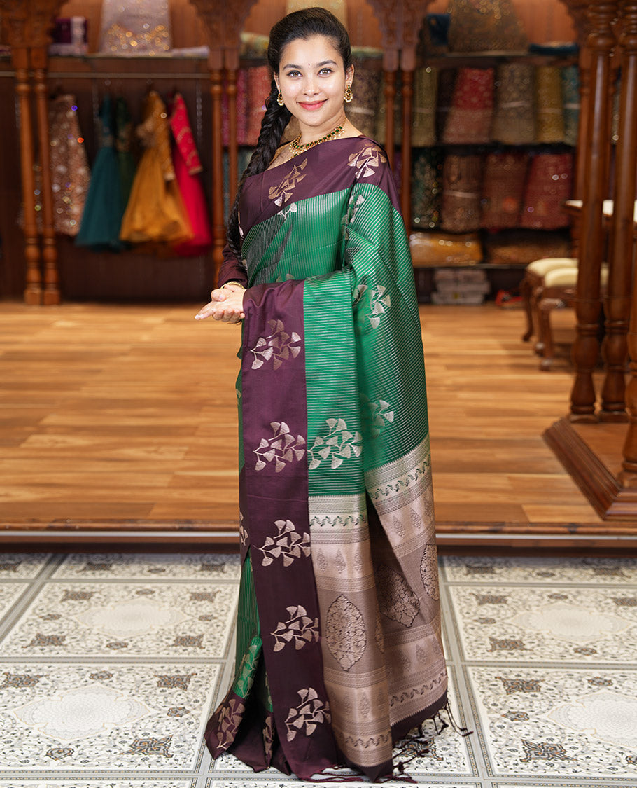 Dark Green Semi-Soft Silk Saree, Highlighted by Vaira Oosai Stripes and Floral Buttas All Over Its Body, Complemented by a Contrast Floral Buttas Border, an Intricately Designed Pallu, and Paired with a Contrast Blouse