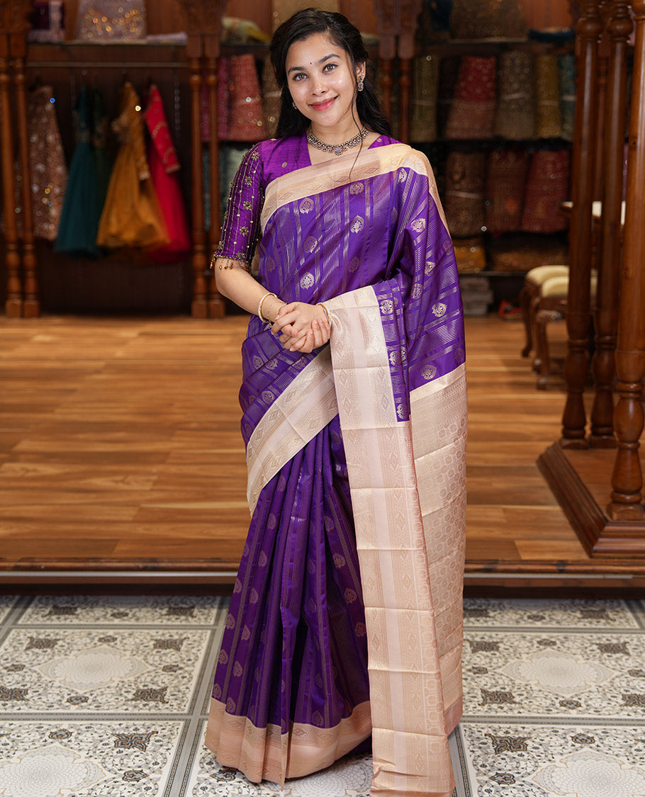 Magenta Pink Litchi Saree, Adorned with Vaira Oosi Stripes and Zari Buttas on Its Body, Complemented by a Contrast Rettai Pettu Traditional Zari Design Border, an Intricately Designed Pallu, and Paired with a Contrast Blouse