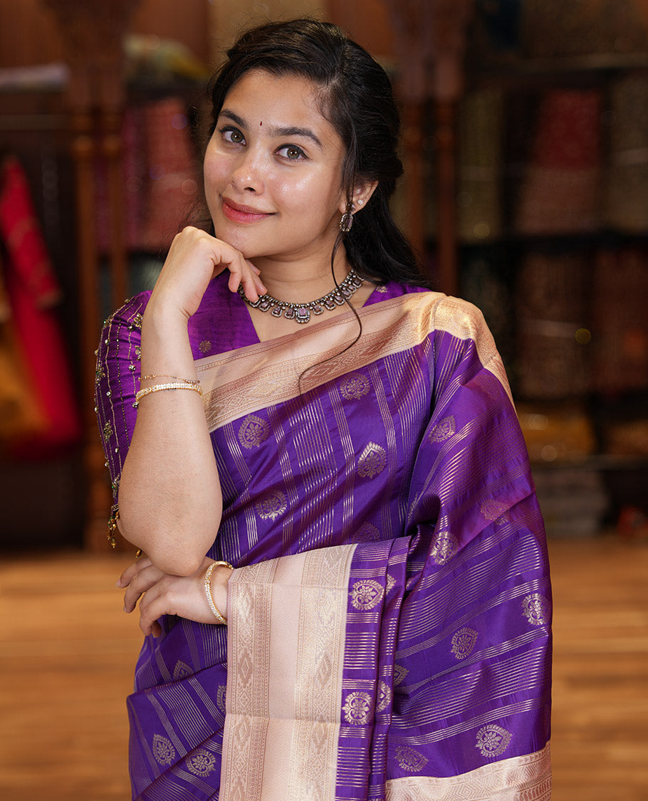 Magenta Pink Litchi Saree, Adorned with Vaira Oosi Stripes and Zari Buttas on Its Body, Complemented by a Contrast Rettai Pettu Traditional Zari Design Border, an Intricately Designed Pallu, and Paired with a Contrast Blouse