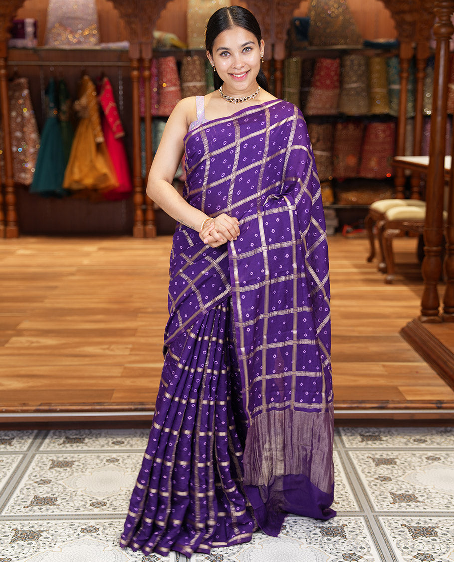 Borderless Purple Assam Silk Saree, Richly Detailed with Bandhani-Dotted Ghar Chola Design on Its Body, Gleaming Zari Pallu, and Paired with a Matching Blouse