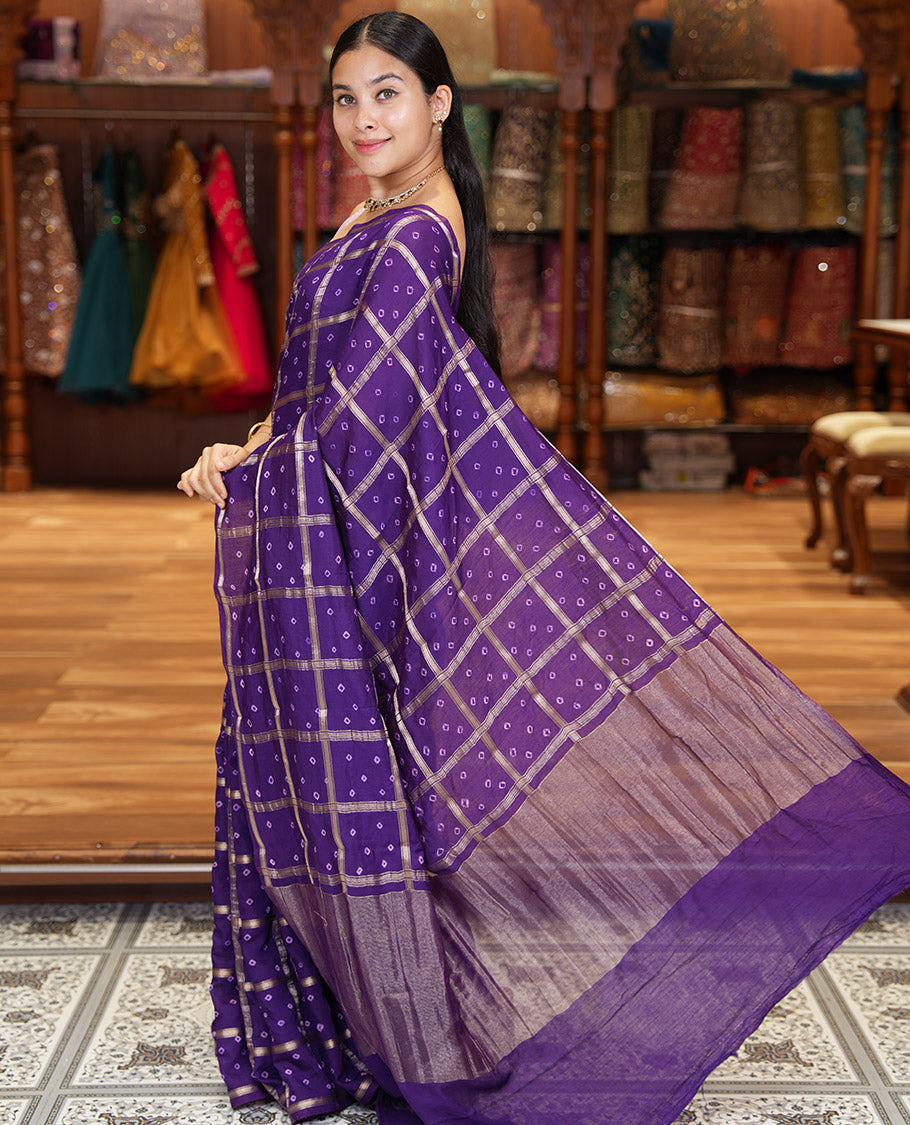 Borderless Purple Assam Silk Saree, Richly Detailed with Bandhani-Dotted Ghar Chola Design on Its Body, Gleaming Zari Pallu, and Paired with a Matching Blouse