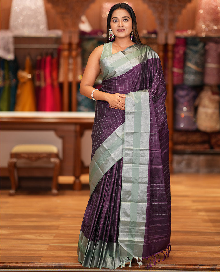 Purple Checked Semi-Soft Silk Saree, Complemented by a Contrast Striped Border, Checked Self-Pallu, and a Matching Blouse