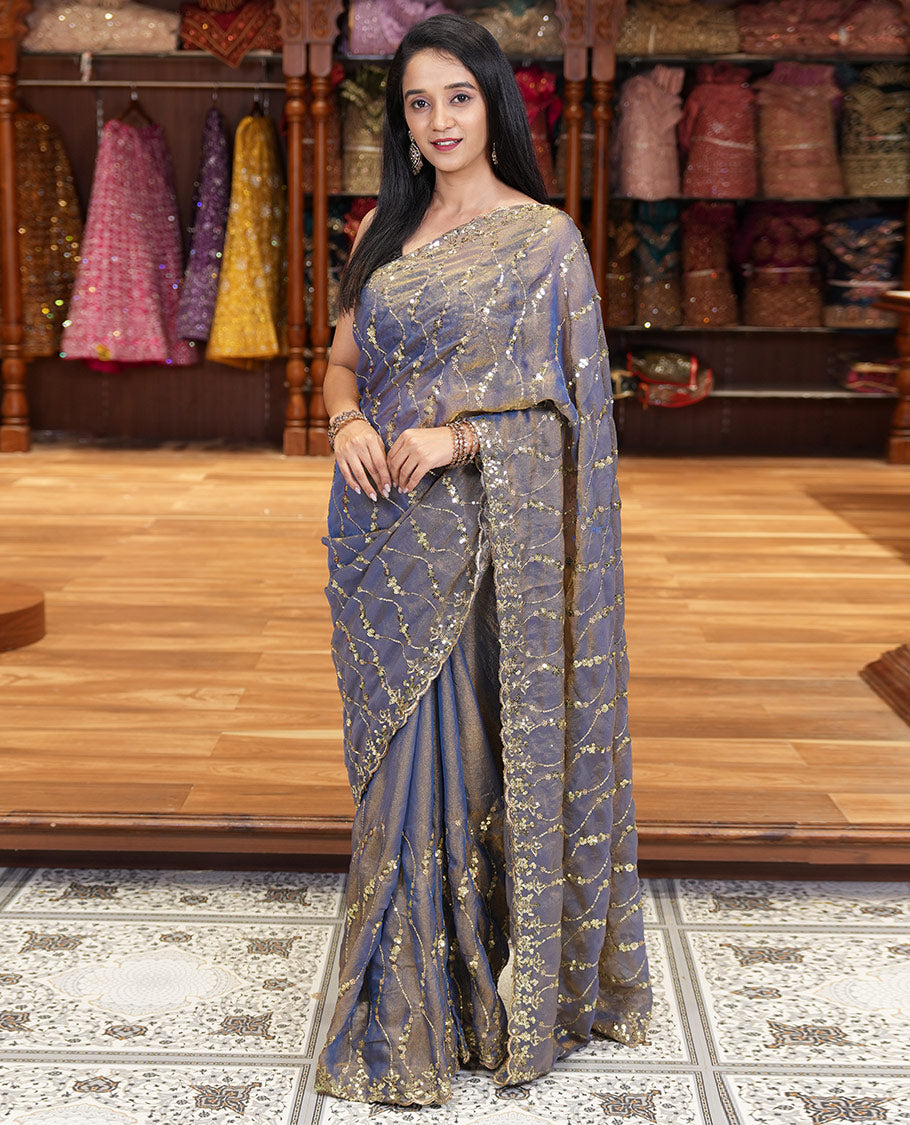 Blue Shimmer Chiffon Saree Elegantly Embellished with Sequins and Thread-Woven Ogee Patterns All Over the Body, Featuring a Scalloped Sequins Work Border, and Paired with a Matching Blouse Embellished with Sequins Work