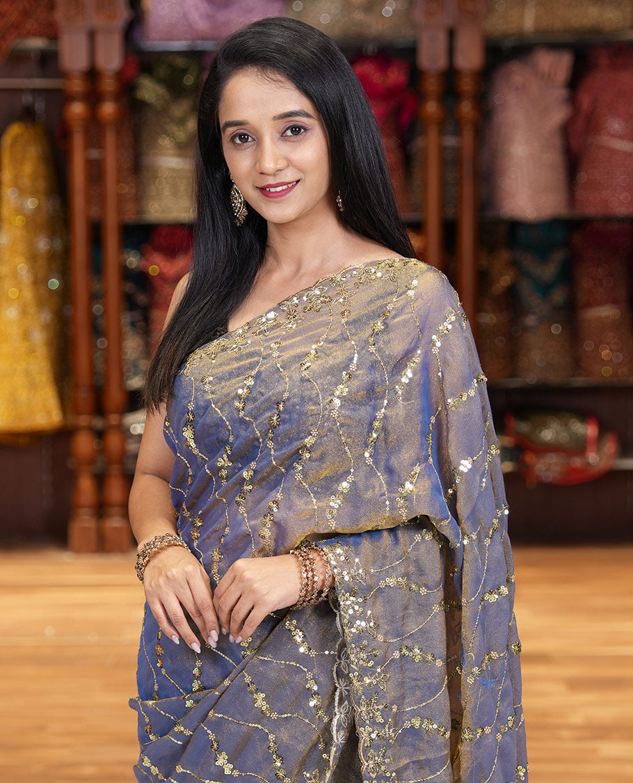 Blue Shimmer Chiffon Saree Elegantly Embellished with Sequins and Thread-Woven Ogee Patterns All Over the Body, Featuring a Scalloped Sequins Work Border, and Paired with a Matching Blouse Embellished with Sequins Work