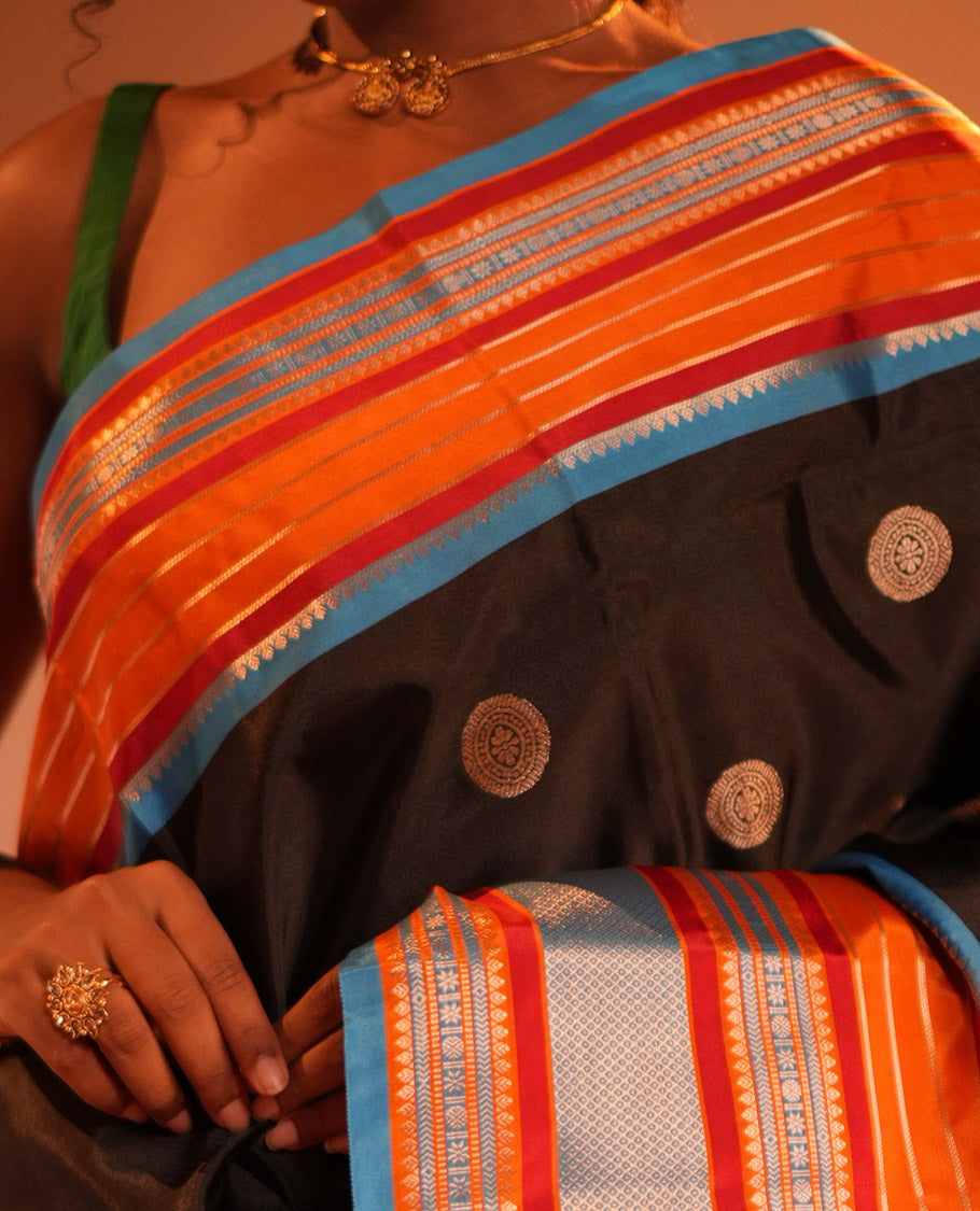 Black Chakram Buttas Semi-Soft Silk Saree