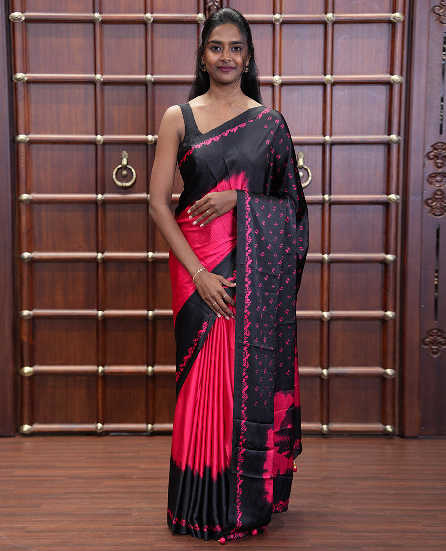 Black and Red Satin Crepe Saree Elevated with Shibori Prints, Complemented by Contrast Shibori Printed Border, Pallu Decked Up with Shibori Prints, and Paired with a Plain Blouse