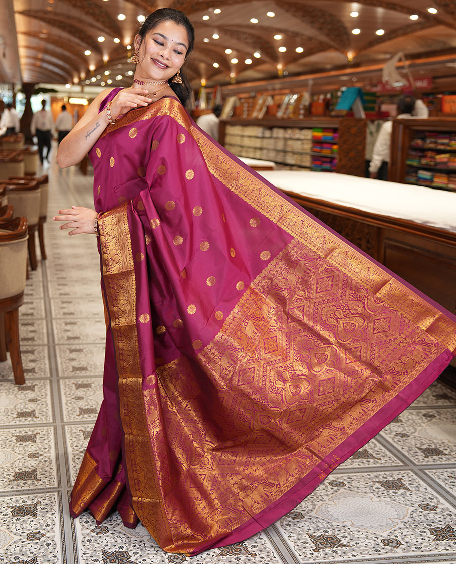 Maroon Art Silk Saree Features Chakra Buttas, a Zari Elephant-Peacock Border, Grand Pallu, Matching Blouse