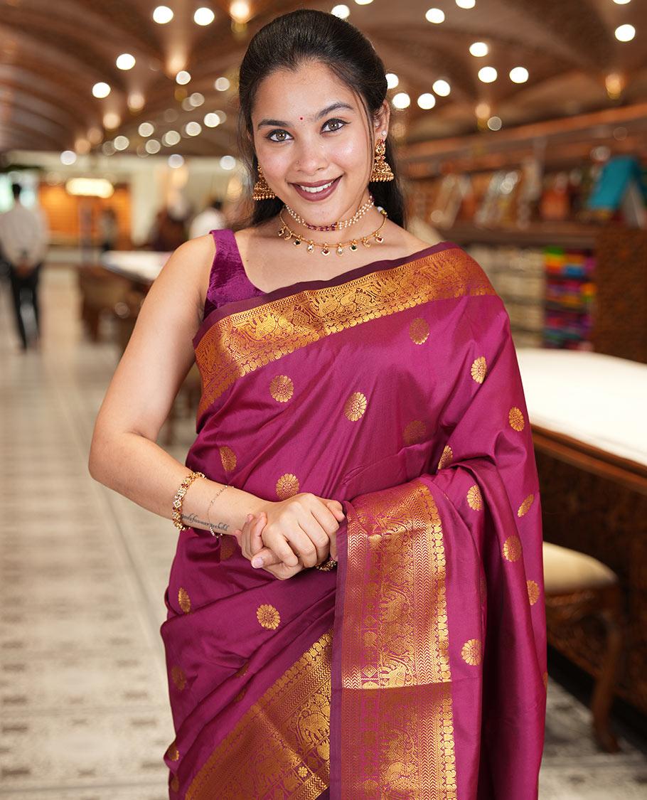 Maroon Art Silk Saree Features Chakra Buttas, a Zari Elephant-Peacock Border, Grand Pallu, Matching Blouse