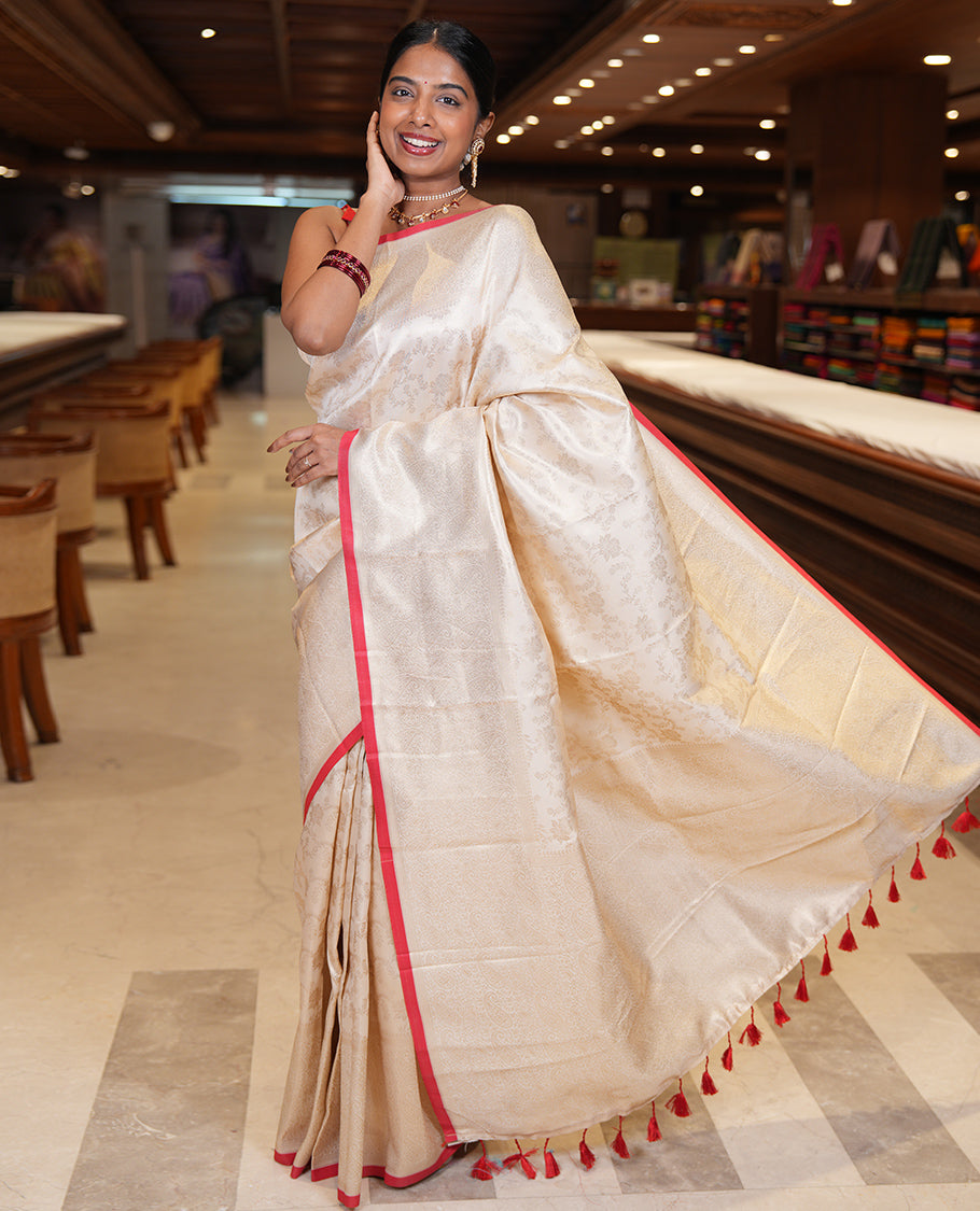 Off-White-Red Semi-Silk Saree, Adorned with Floral Jacquard Design, a Zari Paisley Border, and a Contrast Blouse