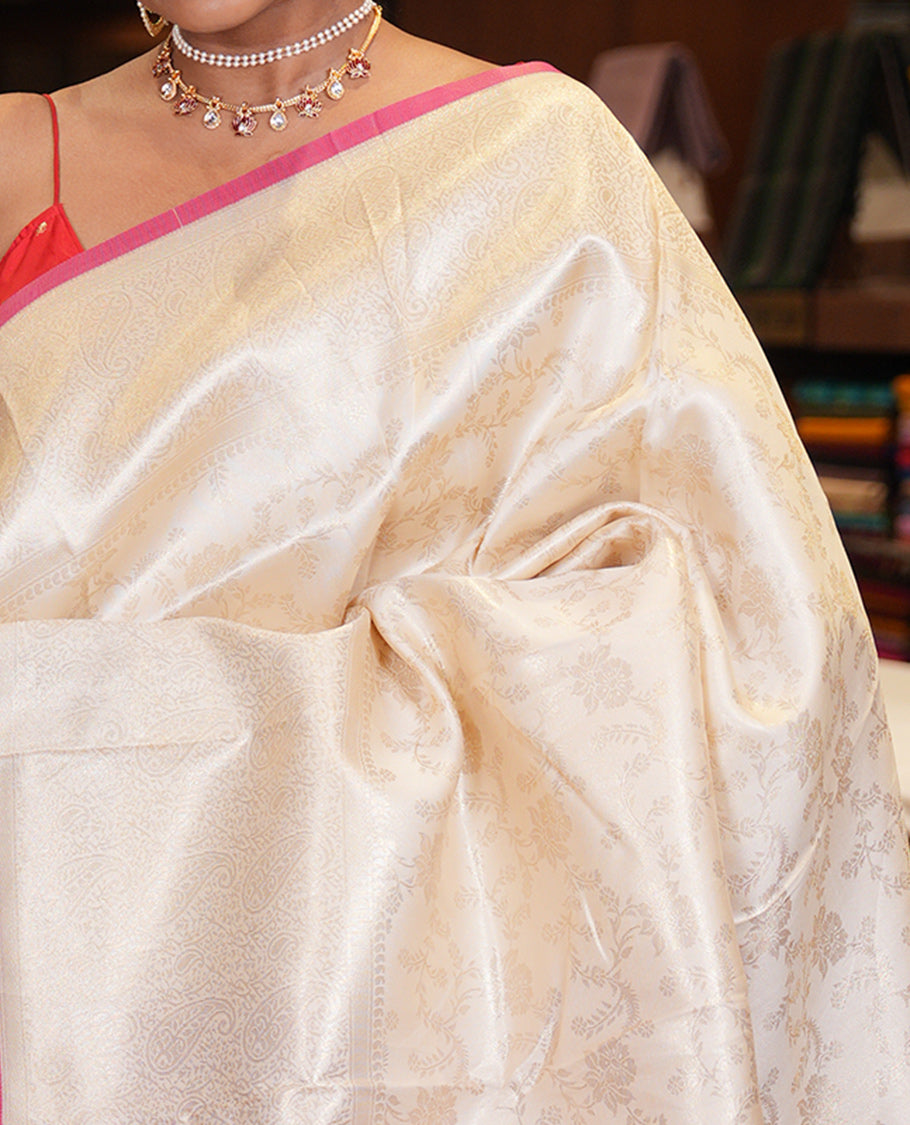 Off-White-Maroon Semi-Silk Saree, Adorned with Floral Jacquard Design, a Zari Paisley Border, and a Contrast Blouse