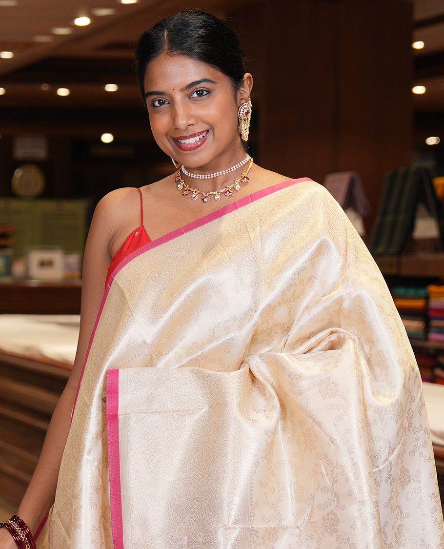 Off-White-Maroon Semi-Silk Saree, Adorned with Floral Jacquard Design, a Zari Paisley Border, and a Contrast Blouse