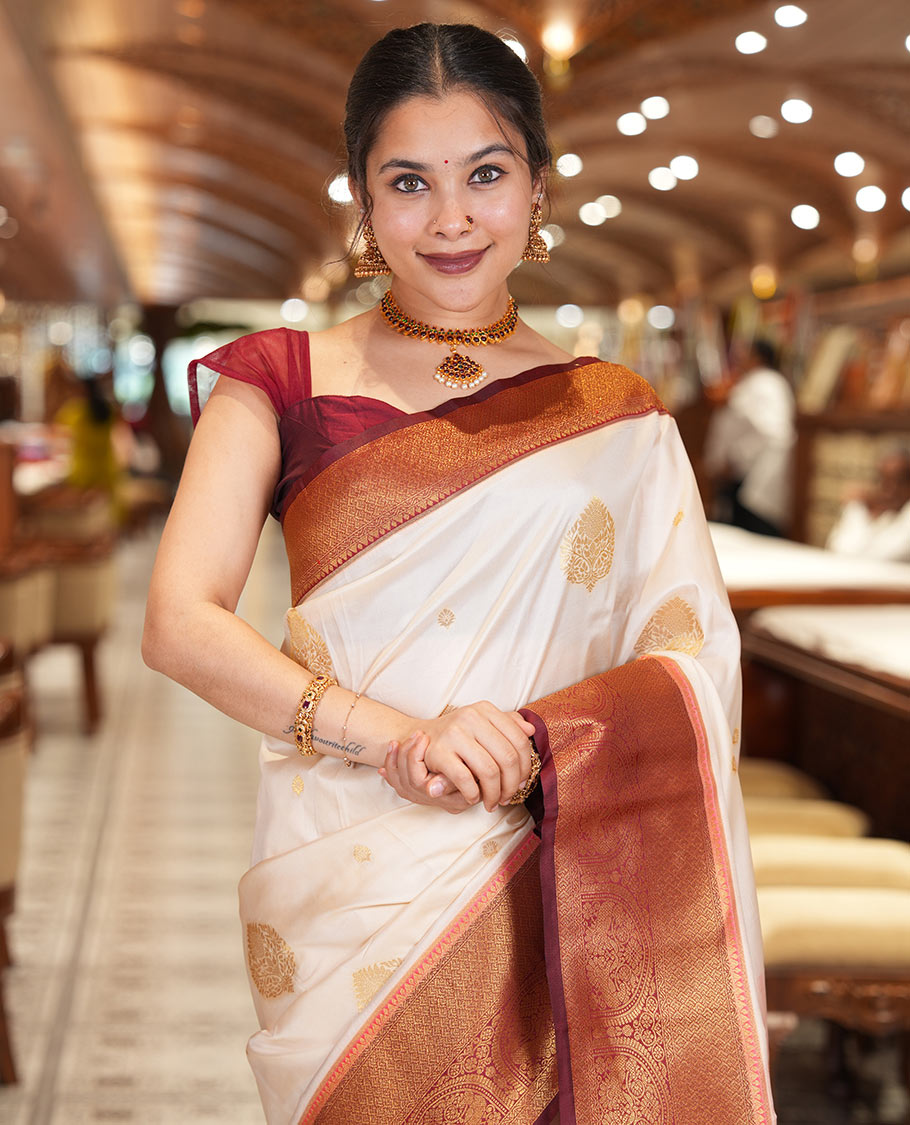 Off-White Art Silk Saree, Entralled with Zari Buttas, Contrast Traditional Border, Grand Pallu and Matching Blouse