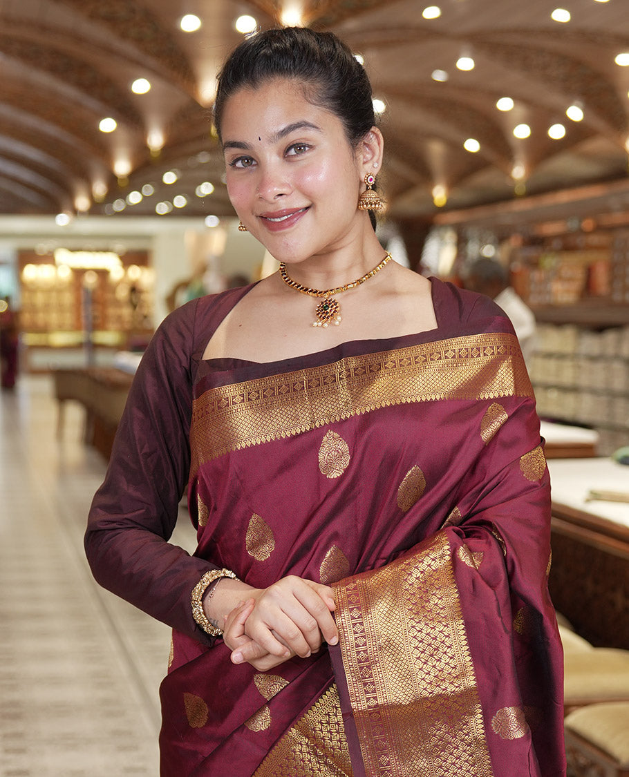 Maroon Art Silk Saree, Enriched with Zari Buttas, Traditional Border, Intricate Pallu, and a Matching Blouse
