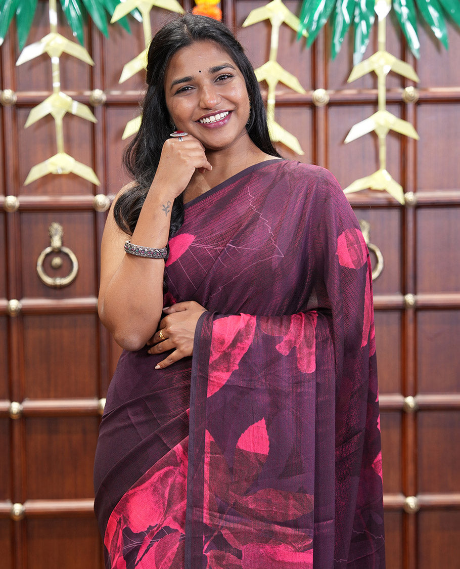 Borderless Maroon Shimmer Chiffon Saree, Artfully Printed with Abstract-Style Floral Print All Over Its Body, Pallu Mirrors the Same Print, and Paired with a Matching Blouse
