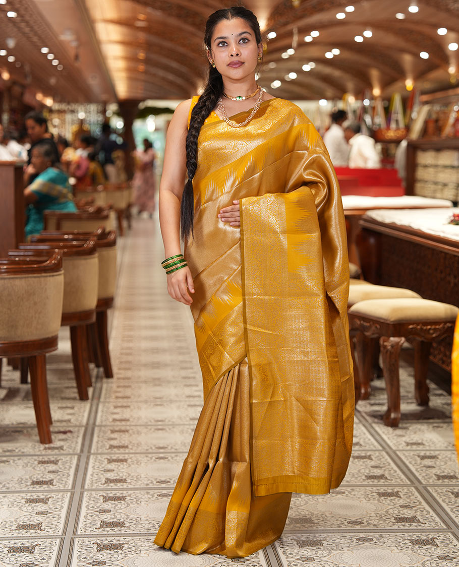 Mustard Litchi Saree Features Tissue-Zari Weave, a Temple Kodi Visiry Border, Grand Pallu and a Matching Blouse