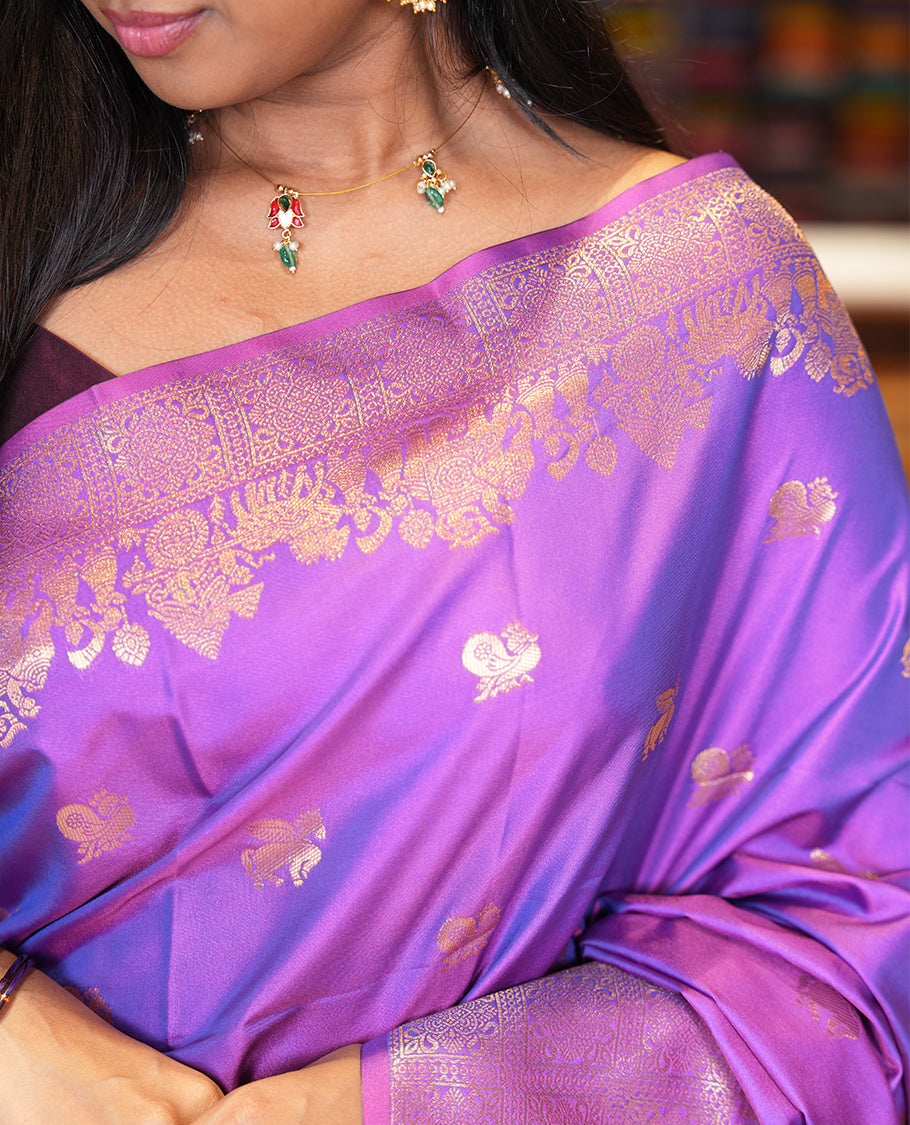Purple Soft Silk Saree, Accentuated with Horse-Peacock Buttas, a Zari Border, Jaal Pallu, and a Matching Blouse