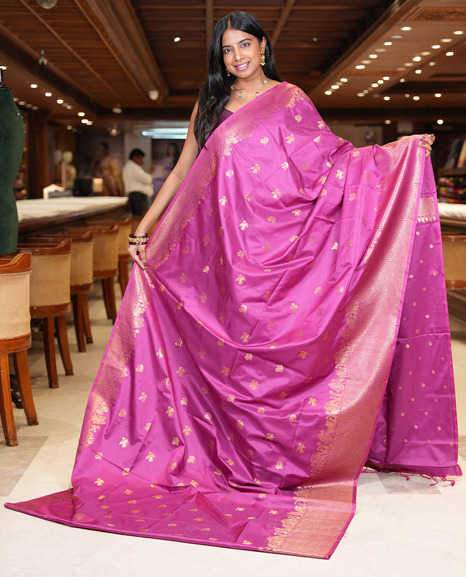 Magenta Soft Silk Saree, Decorated with Horse-Peacock Buttas, a Zari Border, Jaal Pallu, and a Matching Blouse