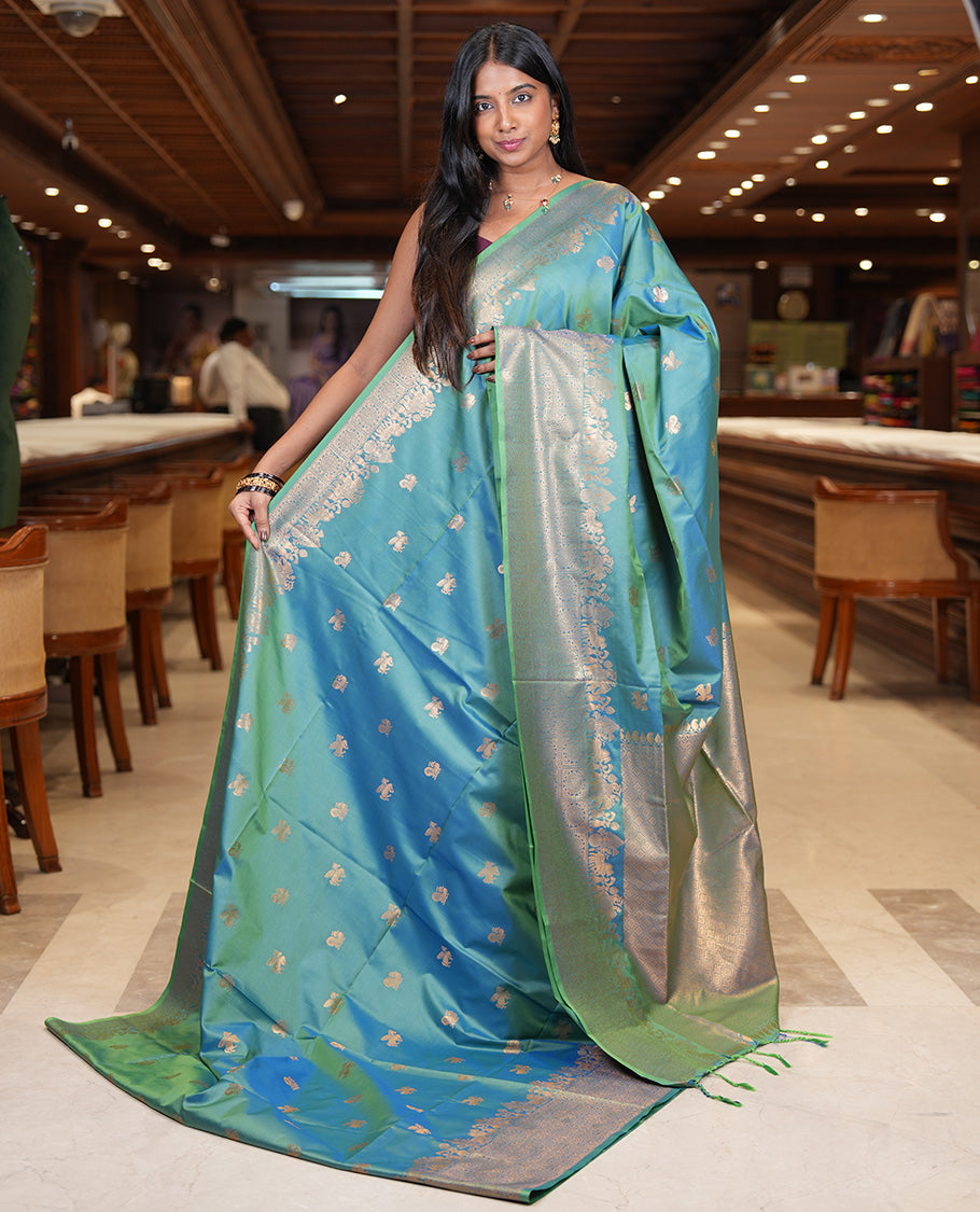 Peacock Blue Soft Silk Saree, Ornamented with Horse-Peacock Buttas, a Zari Border, Jaal Pallu, and a Matching Blouse