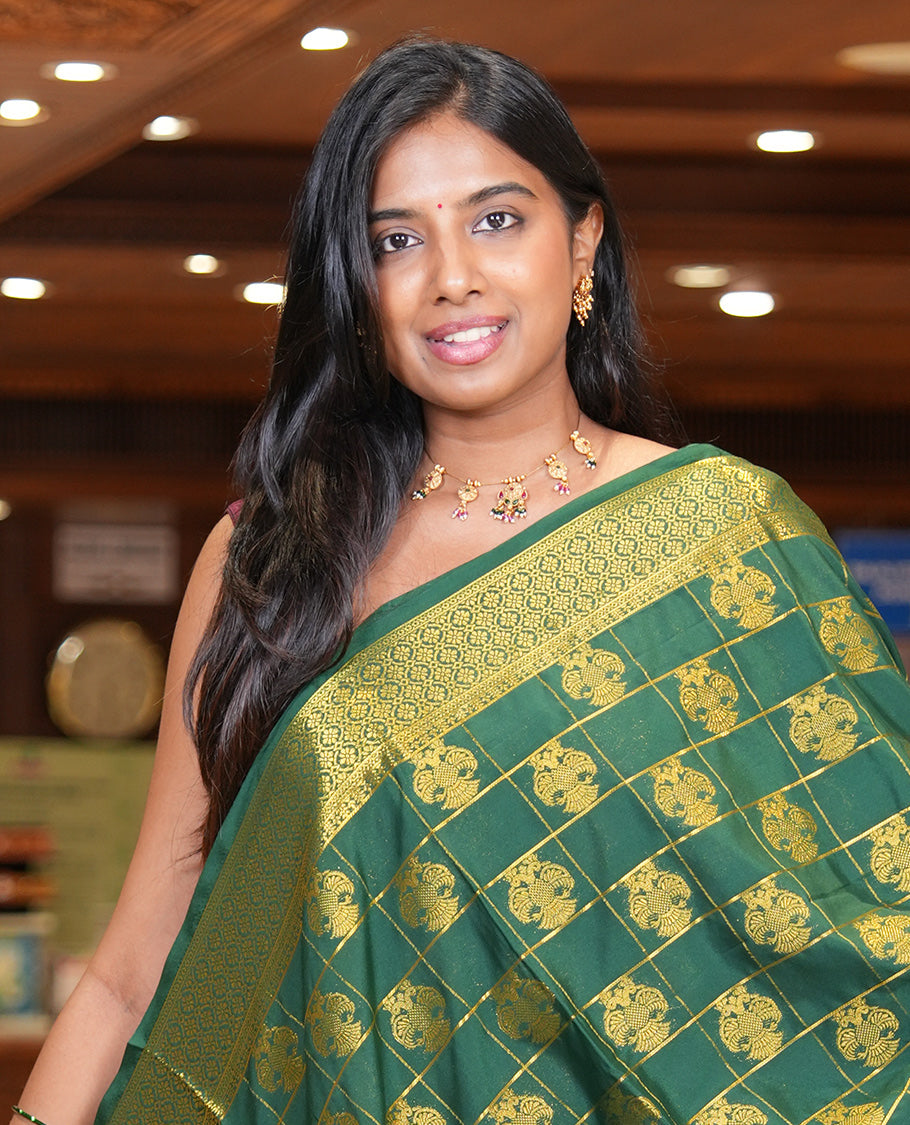 Bottle Green Mysore Silk Saree Features Iruthalai Pakshi Buttas Enclosed Checks, a Traditional Border, Matching Blouse