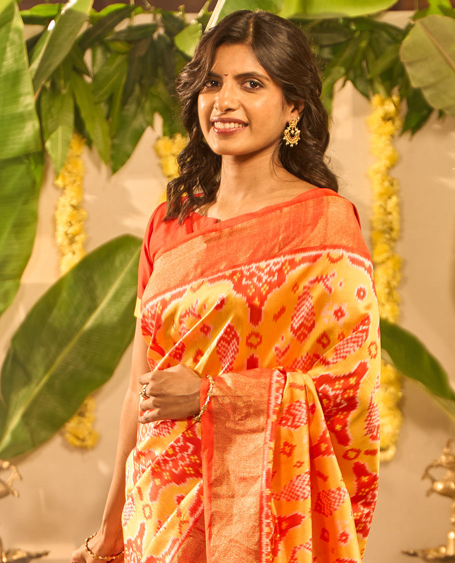 Multi-color fish, floral design ikkat saree with contrast plain border & floral design pallu