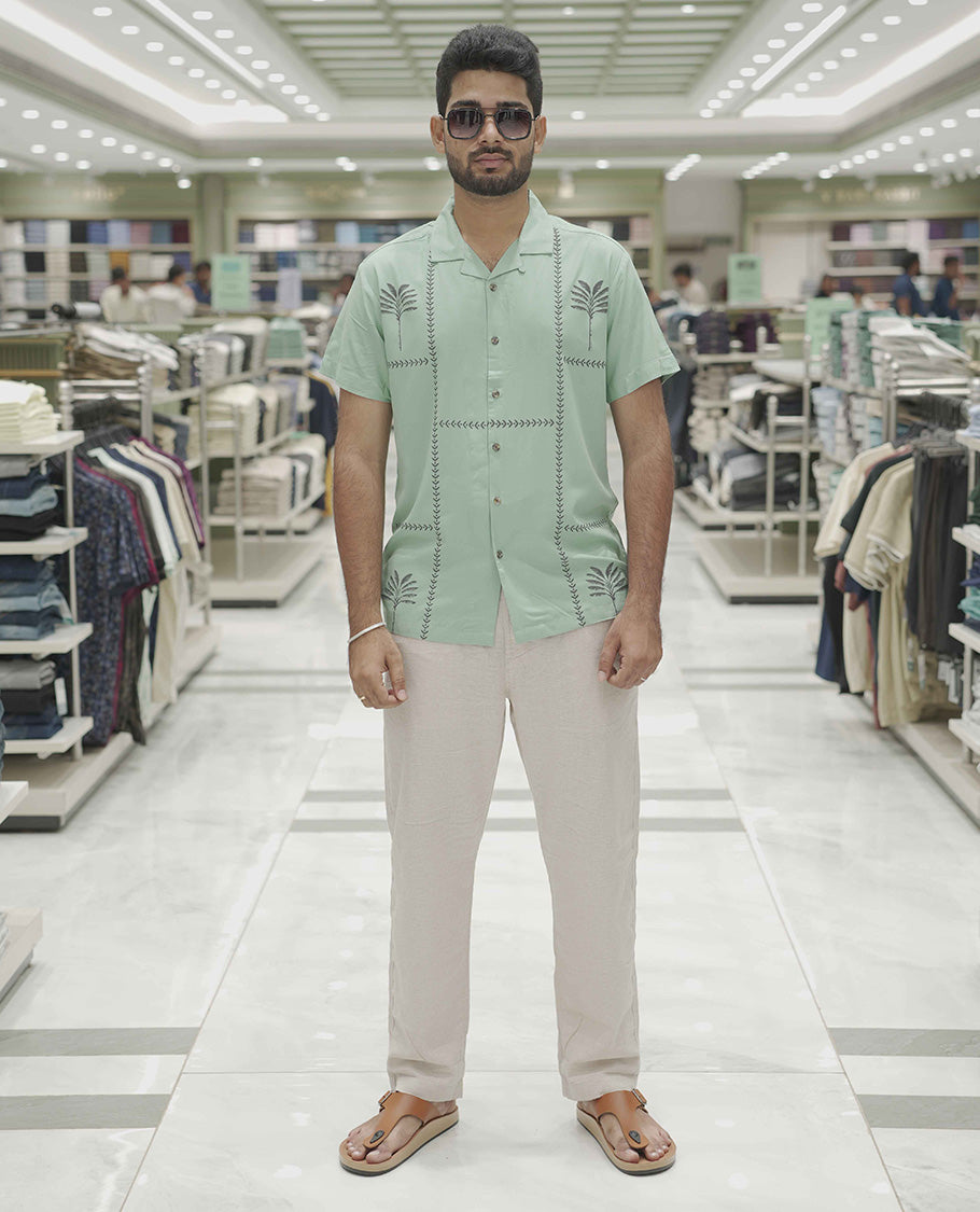 Teal Cotton-Blended Casual Shirt, Subtle Sparkled with Contemporary Prints, Comes with a Cuban Collar, Half-Sleeves, Regular Fit, and Regular Length