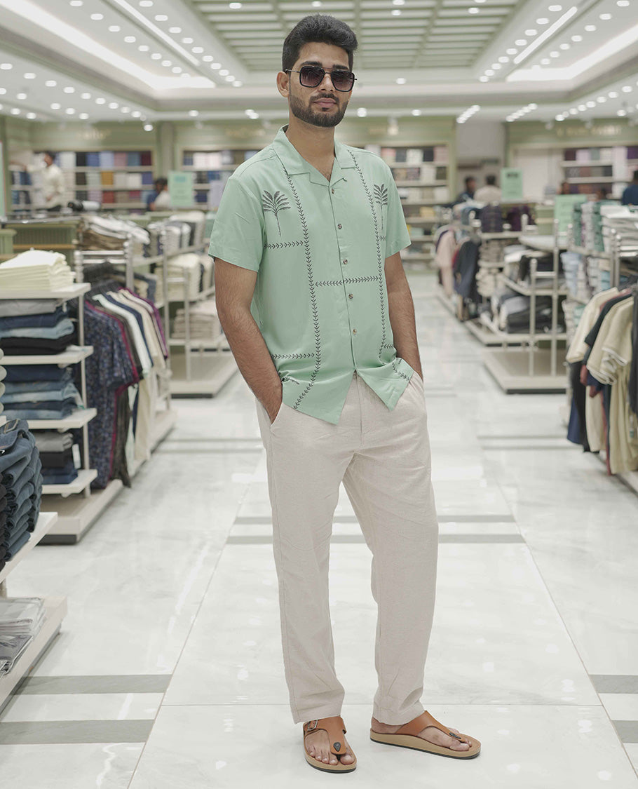 Teal Cotton-Blended Casual Shirt, Subtle Sparkled with Contemporary Prints, Comes with a Cuban Collar, Half-Sleeves, Regular Fit, and Regular Length