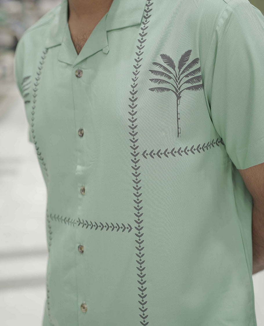 Teal Cotton-Blended Casual Shirt, Subtle Sparkled with Contemporary Prints, Comes with a Cuban Collar, Half-Sleeves, Regular Fit, and Regular Length