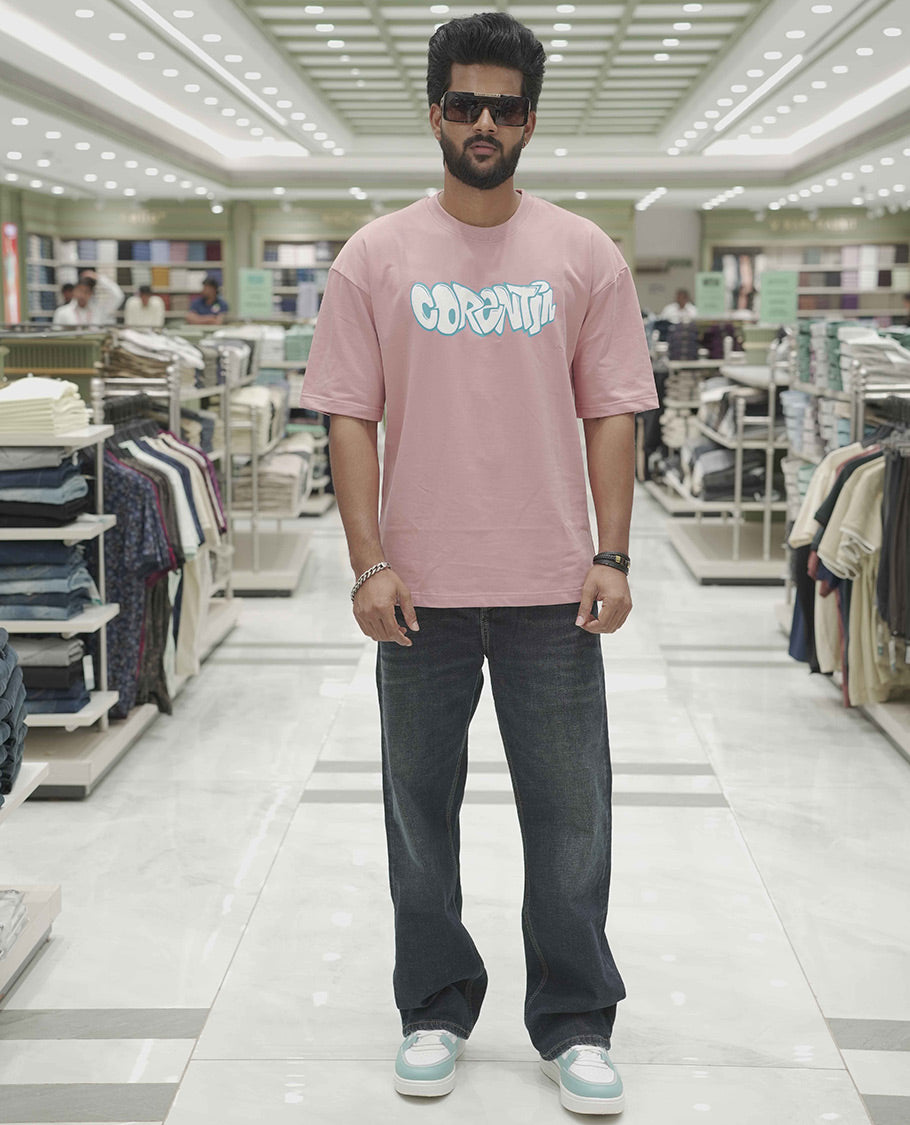 Pink Cotton-Blended Oversized T-Shirt, Elevated with Multi-Color Funky Motifs Front and Back Print, Comes with a Crew-Neck, Half-Sleeves, and Long Length