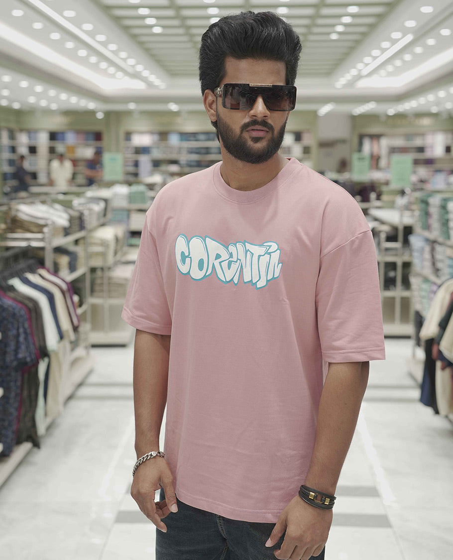 Pink Cotton-Blended Oversized T-Shirt, Elevated with Multi-Color Funky Motifs Front and Back Print, Comes with a Crew-Neck, Half-Sleeves, and Long Length