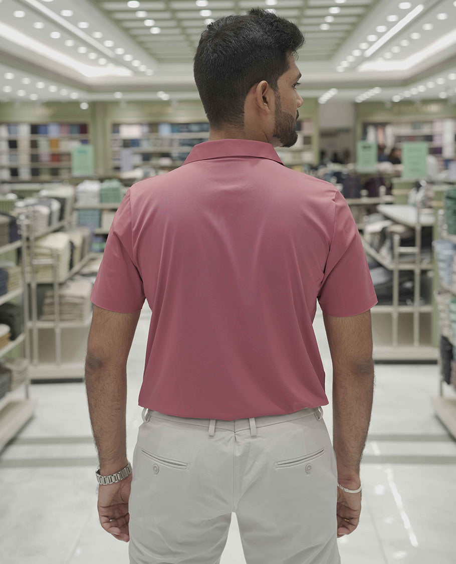 Pink Plain Poly Lycra Blended Casual Shirt, Comes with a Spread Collar, Stitchless Half-Sleeves, Slim Fit, and Regular Length