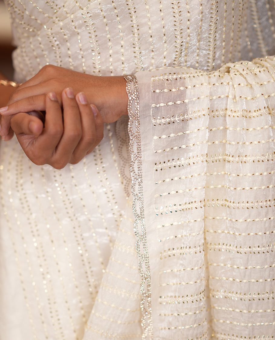 Cream Fendi Chiffon Saree, Bead Embroidery, a Scalloped Border, a Matching Blouse
