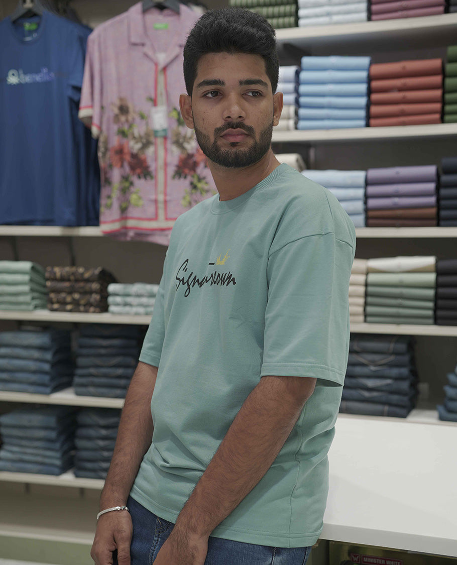 Blue Cotton-Blended Oversized T-Shirt, Elevated with Multi-Color Funky Motifs Front and Back Print, Comes with a Crew-Neck, Half-Sleeves, and Long Length