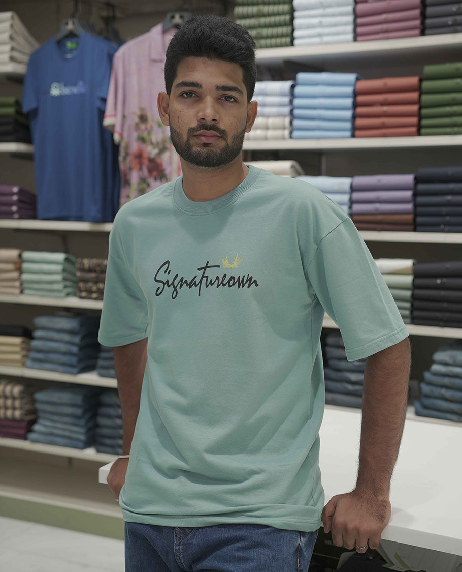 Blue Cotton-Blended Oversized T-Shirt, Elevated with Multi-Color Funky Motifs Front and Back Print, Comes with a Crew-Neck, Half-Sleeves, and Long Length