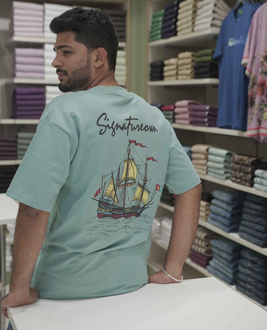 Blue Cotton-Blended Oversized T-Shirt, Elevated with Multi-Color Funky Motifs Front and Back Print, Comes with a Crew-Neck, Half-Sleeves, and Long Length