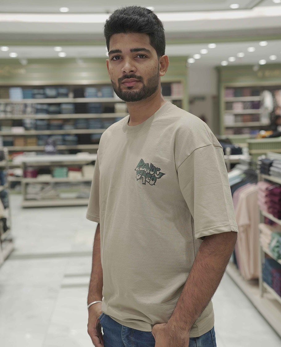 Cream Cotton-Blended Oversized T-Shirt, Elevated with Multi-Color Funky Motifs Front and Back Print, Comes with a Crew-Neck, Half-Sleeves, and Long Length