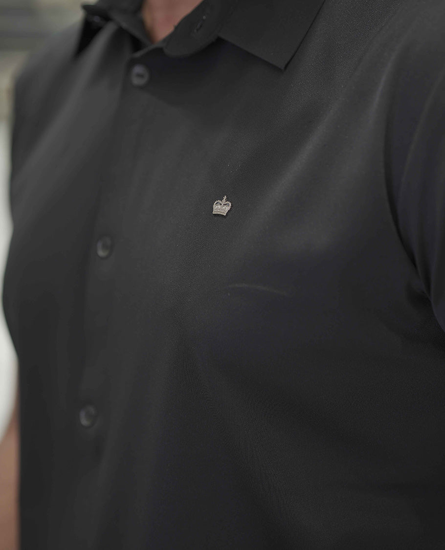 Black Plain Poly Lycra Blended Casual Shirt, Comes with a Spread Collar, Stitchless Half-Sleeves, Slim Fit, and Regular Length