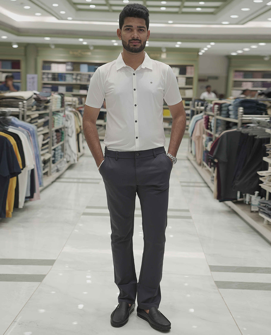 Cream Plain Poly Lycra Blended Casual Shirt, Comes with a Spread Collar, Stitchless Half-Sleeves, Slim Fit, and Regular Length