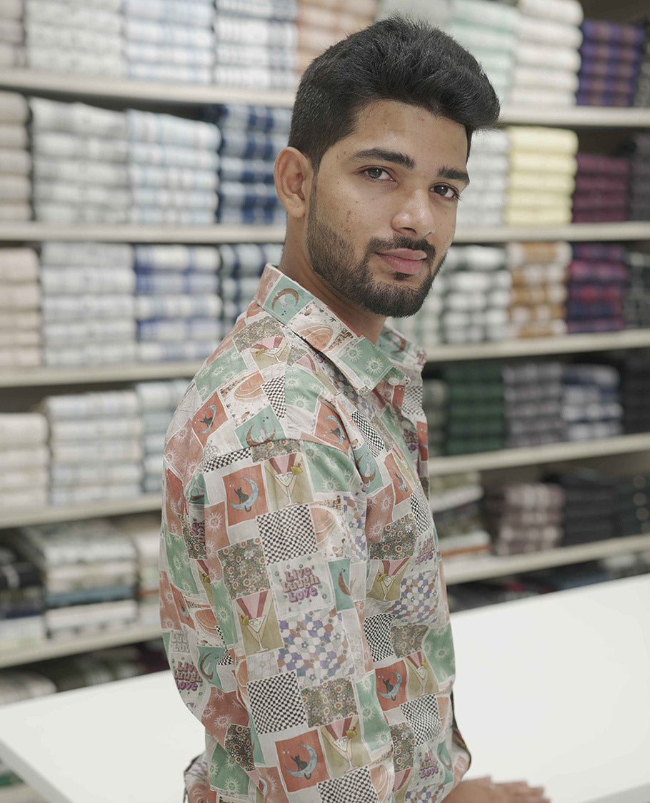 Multi Color Cotton-Blended Casual Shirt, Highlighted with Unique Motifs Print, Comes with a Spread Collar, Full-Sleeves, Slim Fit, and Regular Length