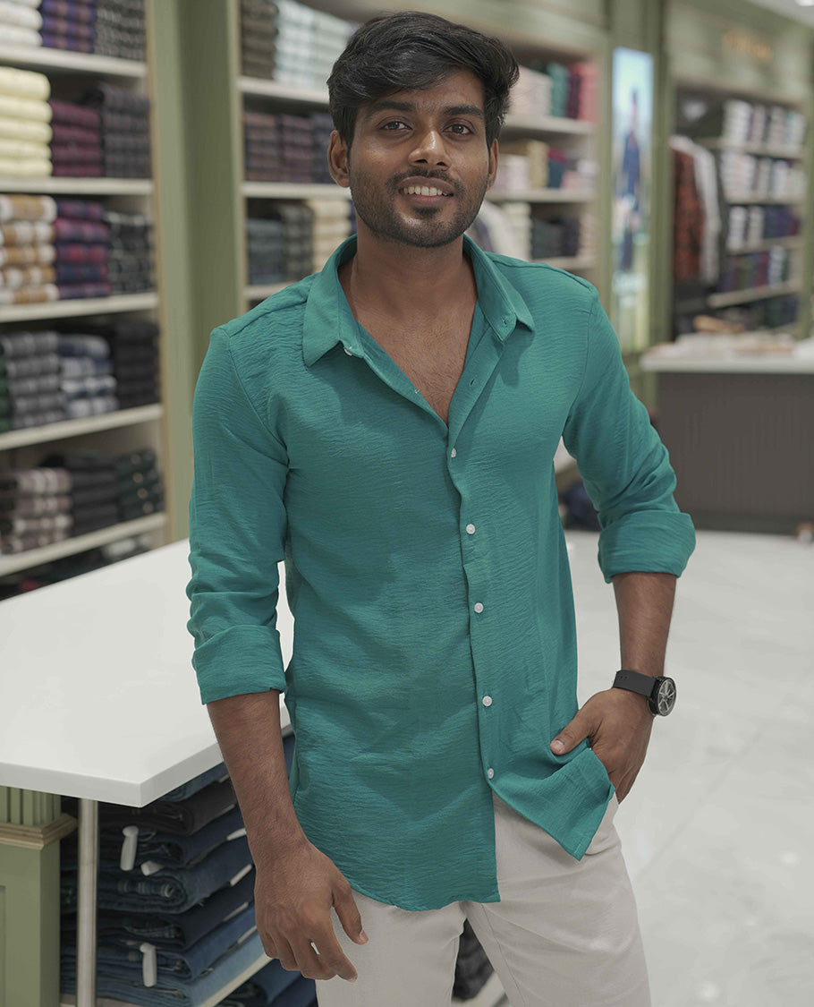 Teal Plain Poly-Blend Casual Shirt, Comes with a Spread Collar, Full-Sleeves, Slim Fit, and Regular Length