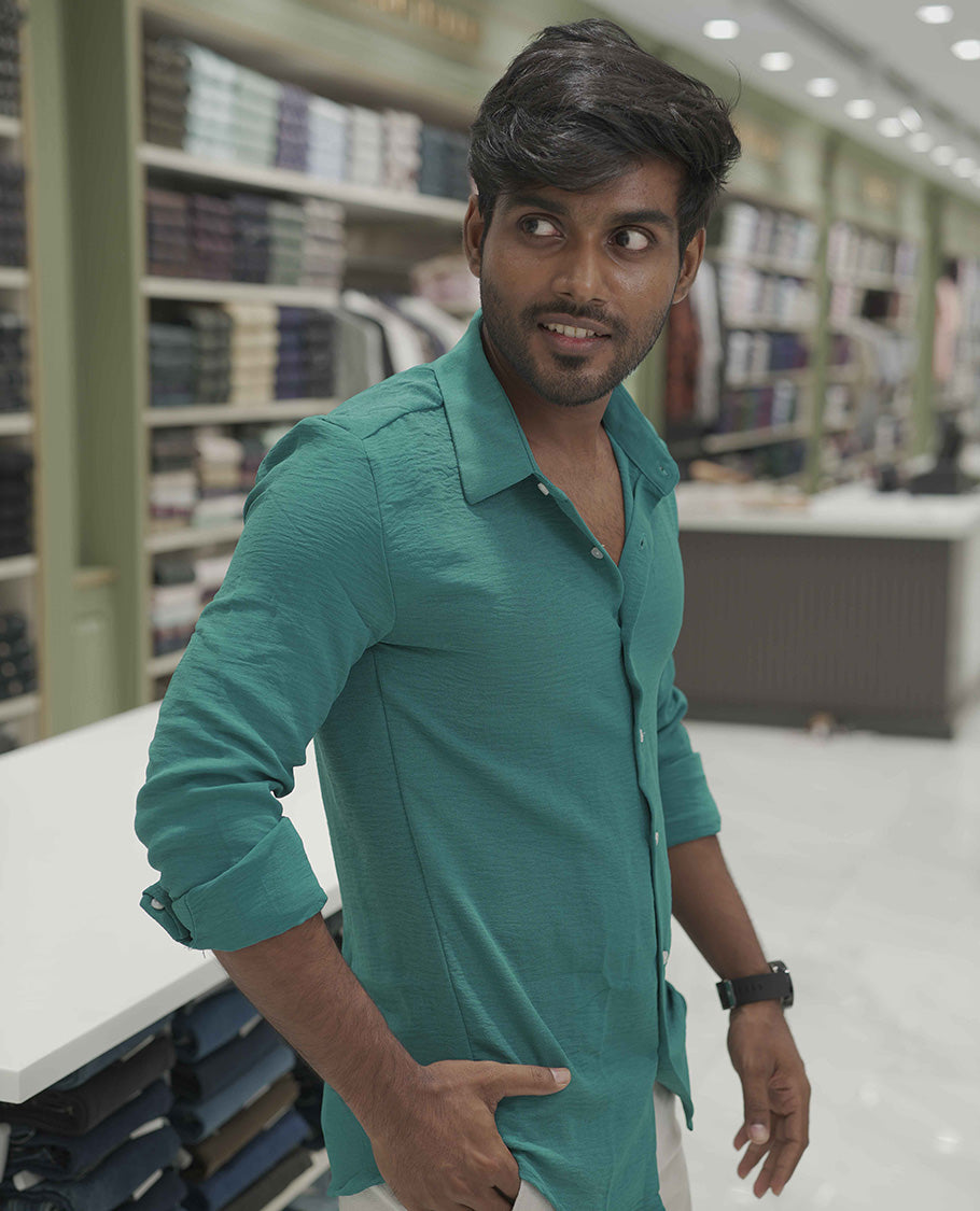 Teal Plain Poly-Blend Casual Shirt, Comes with a Spread Collar, Full-Sleeves, Slim Fit, and Regular Length