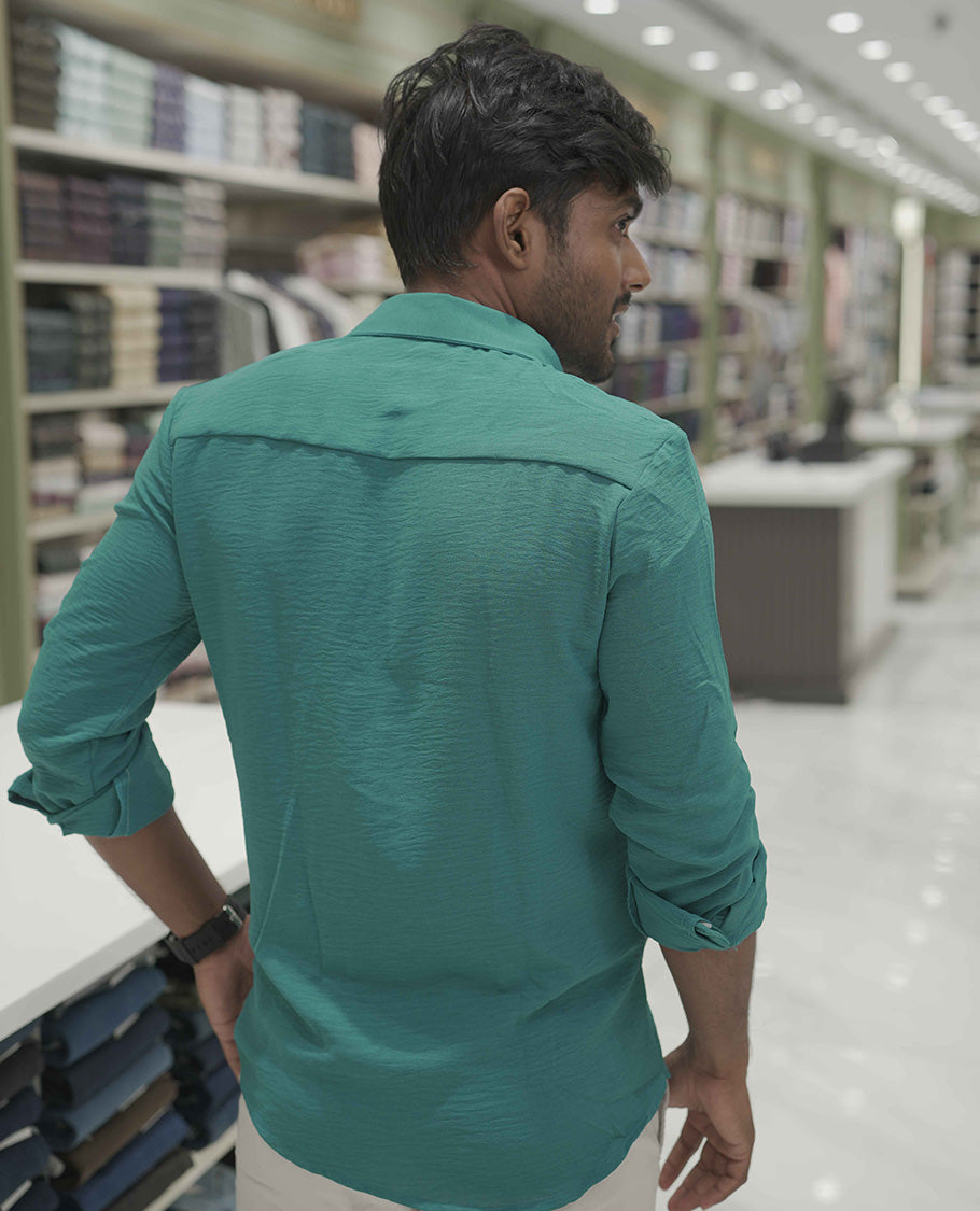 Teal Plain Poly-Blend Casual Shirt, Comes with a Spread Collar, Full-Sleeves, Slim Fit, and Regular Length
