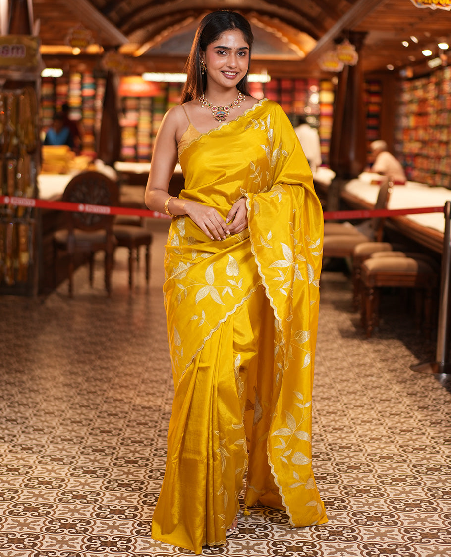 Mustard Yellow Dupion Silk Saree, Delicately Decked Up with Floral-Leaf Vine Embroidered On Its Body, Subtle Scallop Border, Artfully Floral Embroidered Pallu, and Paired with a Plain Blouse
