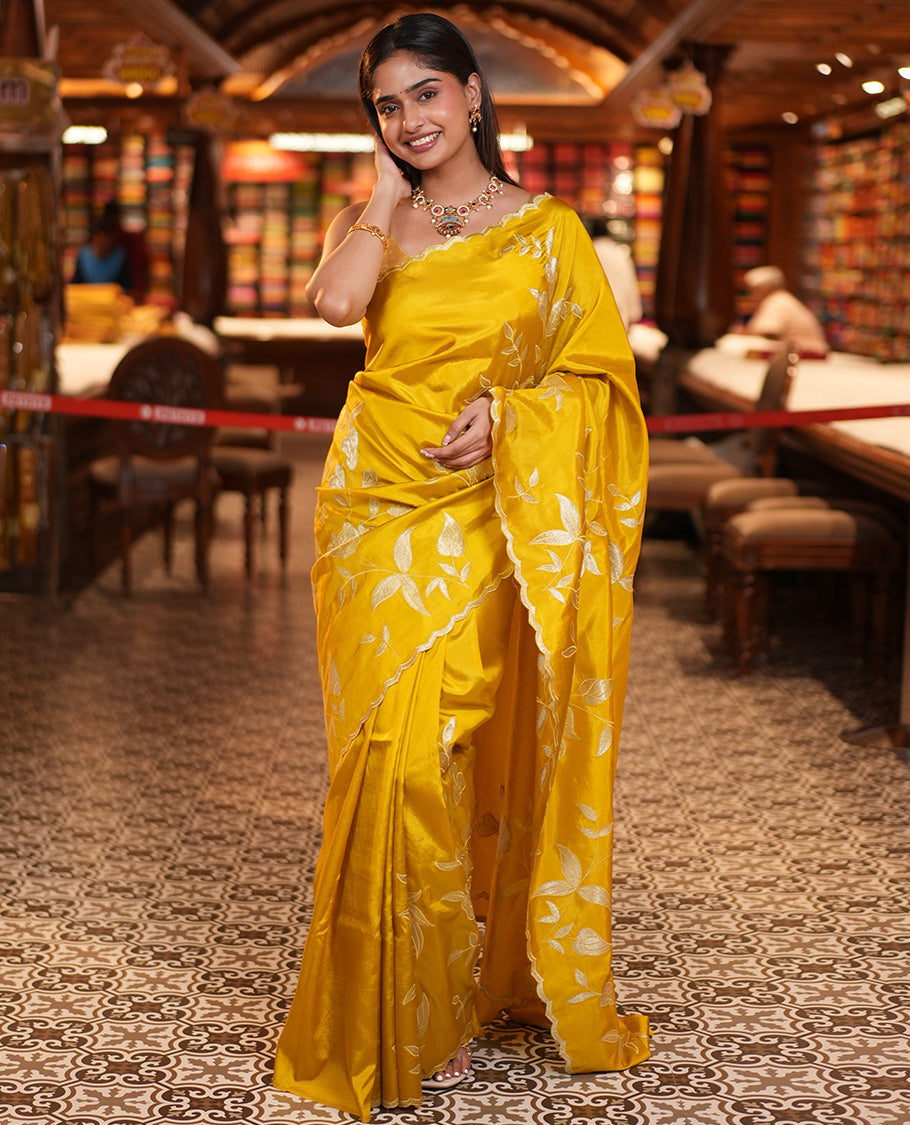 Mustard Yellow Dupion Silk Saree, Delicately Decked Up with Floral-Leaf Vine Embroidered On Its Body, Subtle Scallop Border, Artfully Floral Embroidered Pallu, and Paired with a Plain Blouse