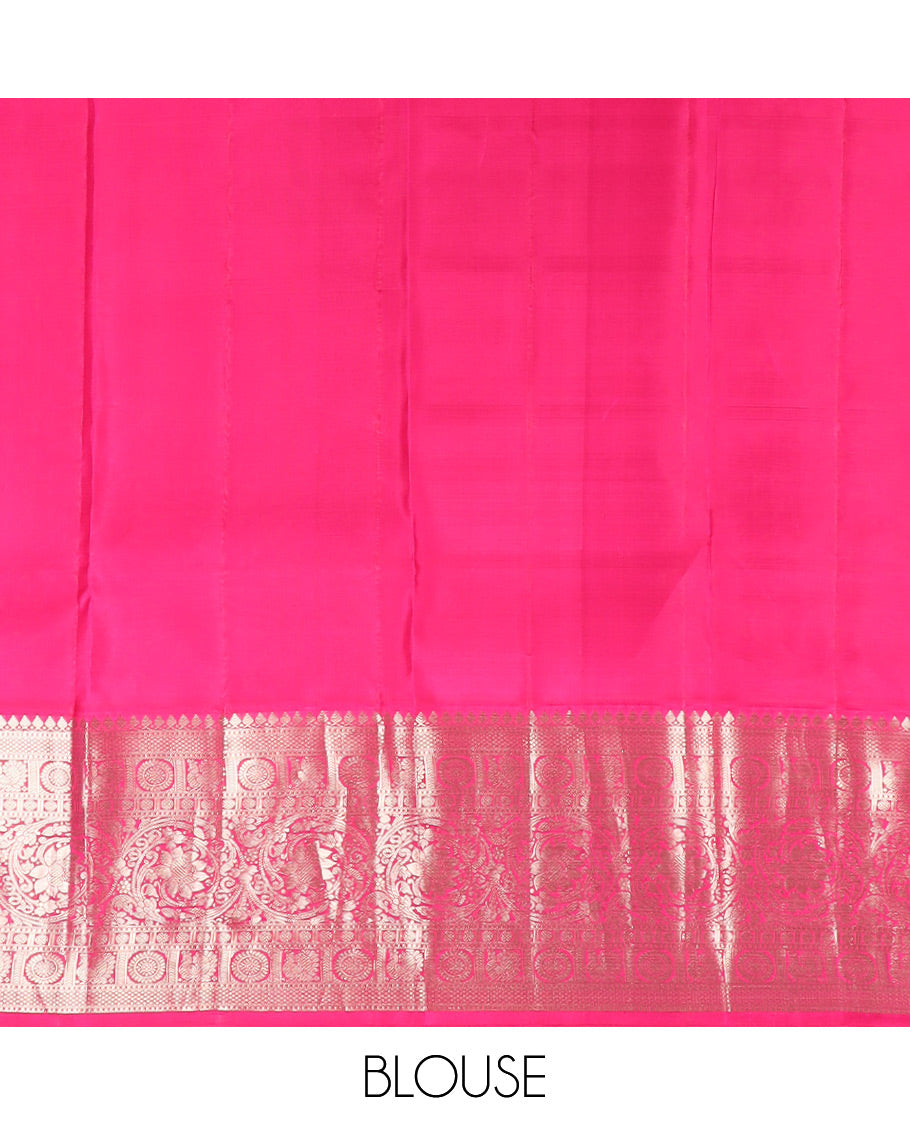 Parrot Green Vasundhara Silk Saree Featuring Veldhari and Round Kuthirai Motifs, Complemented by a Contrast Border of Thilakam Mokku, Muthu, Annam Chakram, and Kodi Visiry Designs, Pallu Elevated with Floral Designs, and Paired with a Contrast Blouse