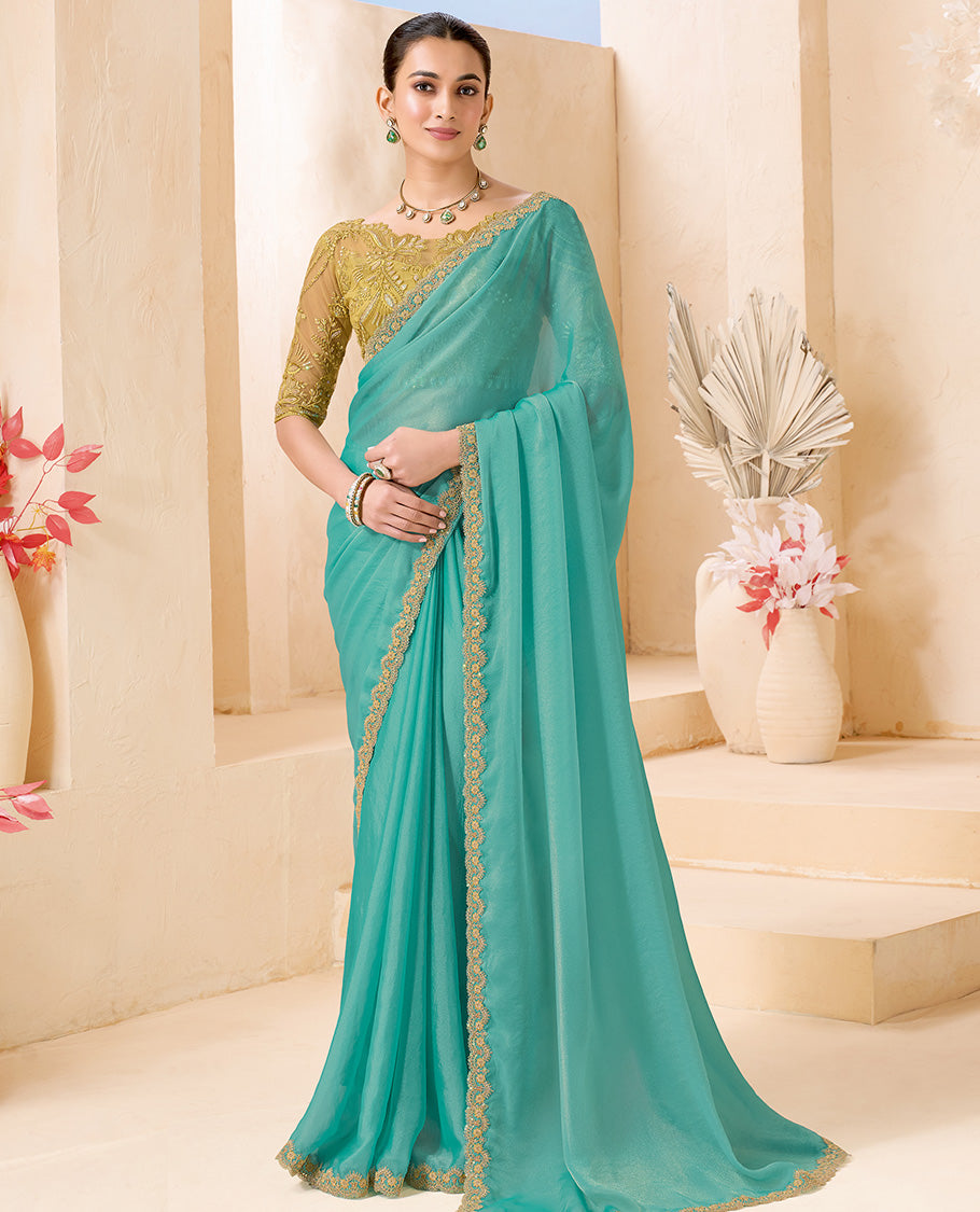 Turquoise Plain Designer Saree, Scallop Embroidered Border, a Self-Pallu, and Paired with a Contrast Intricately Embroidered Blouse