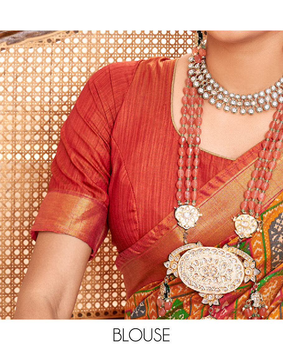 Orange Patola Fancy Raw Silk Designer Saree, Adorned with Intricate Design, a Bavanji Border, Intricately Designed Pallu, and a Contrast Blouse